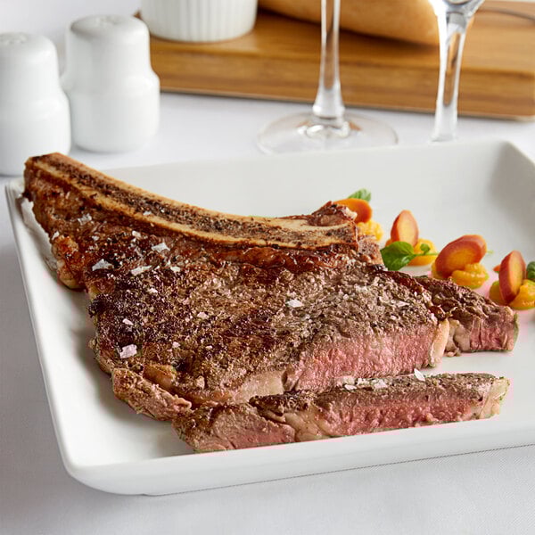 Cooked ribeye steak on a plate