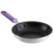 An 8" aluminum fry pan with a purple silicone handle.
